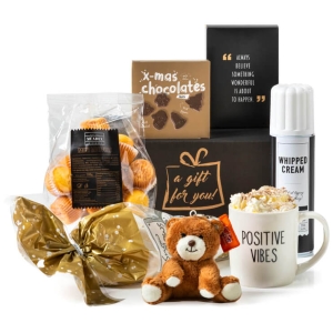 Kerstpakketten voor haar met luxe producten en lekkere snacks